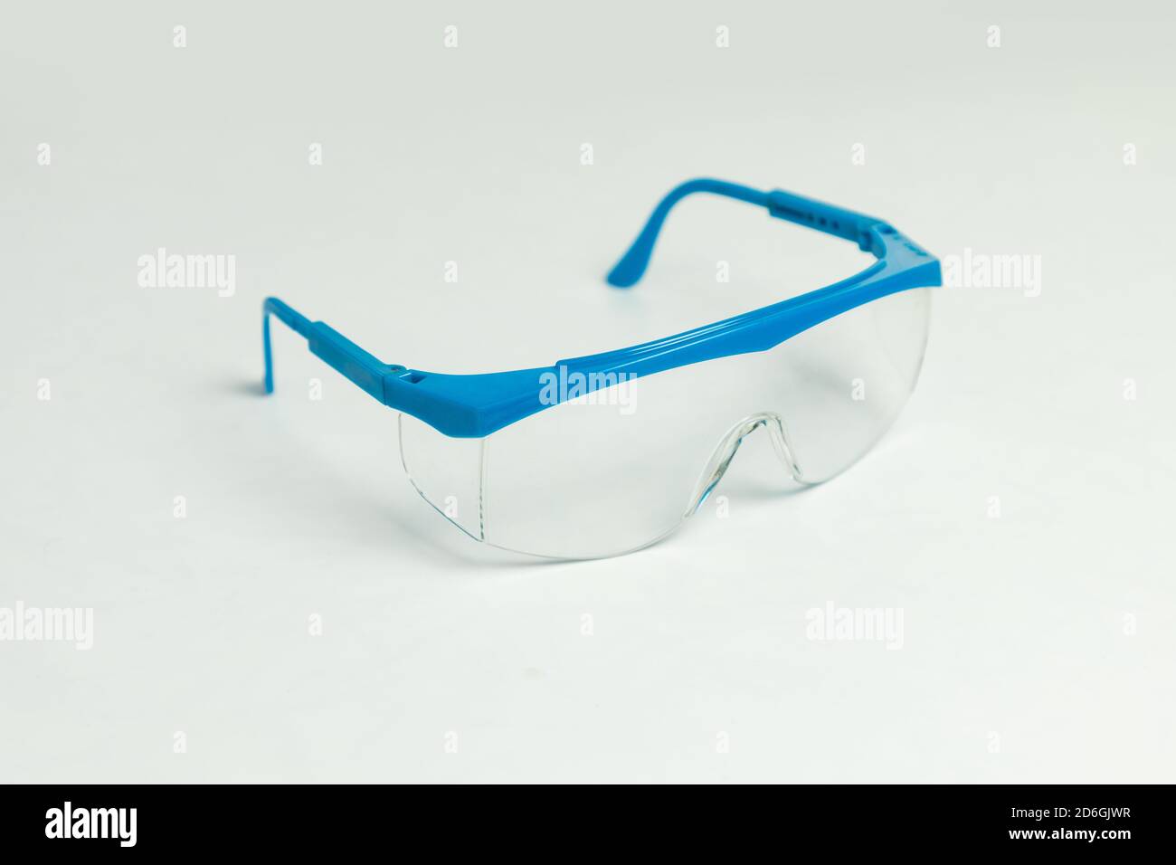Blue industrial safety glasses isolated on white Stock Photo Alamy