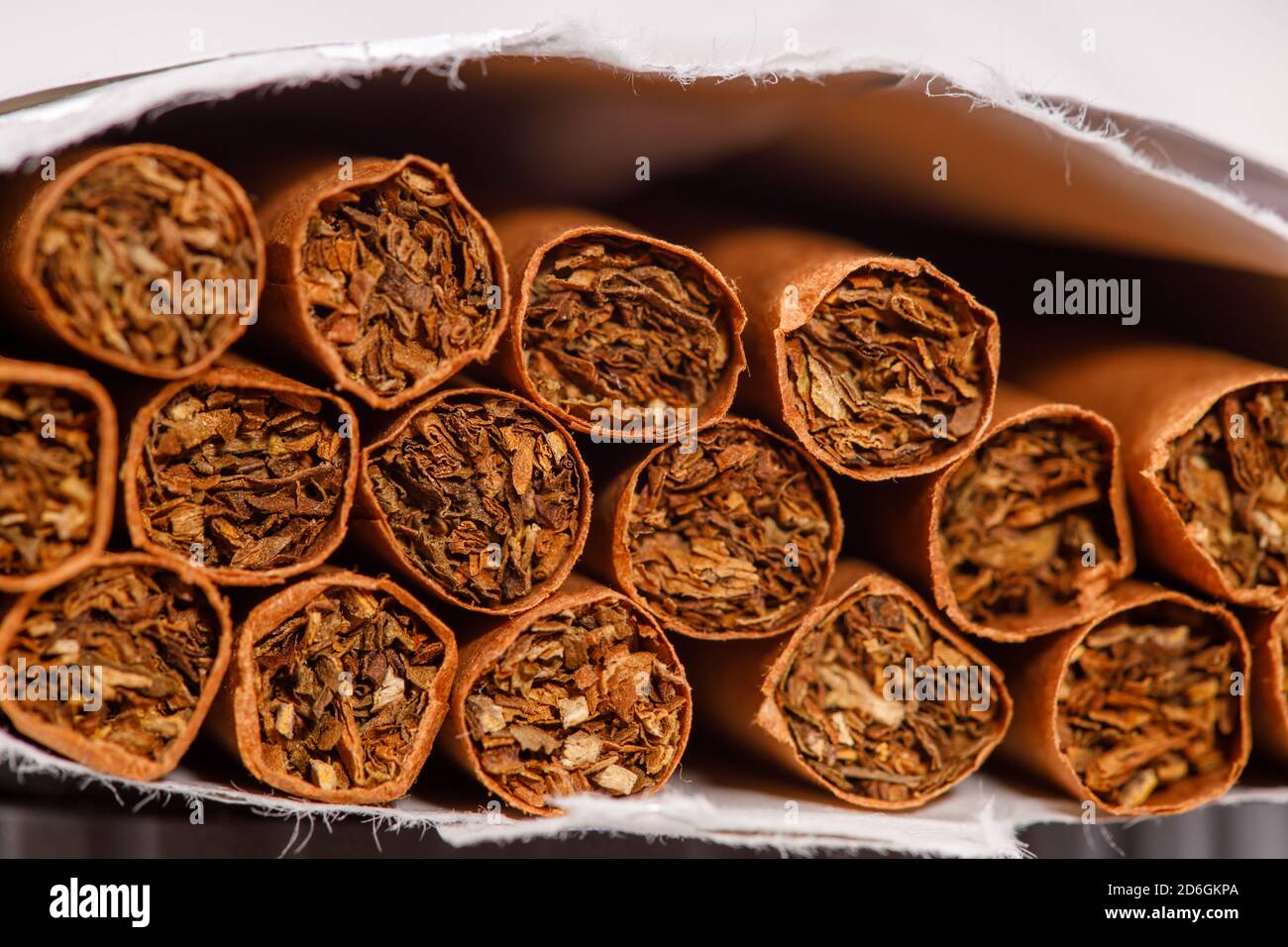 brown cigarettes in a pack close-up. horizontal frame Stock Photo