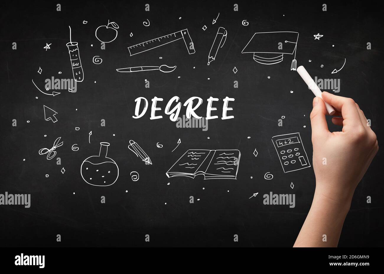 Hand drawing DEGREE inscription with white chalk on blackboard