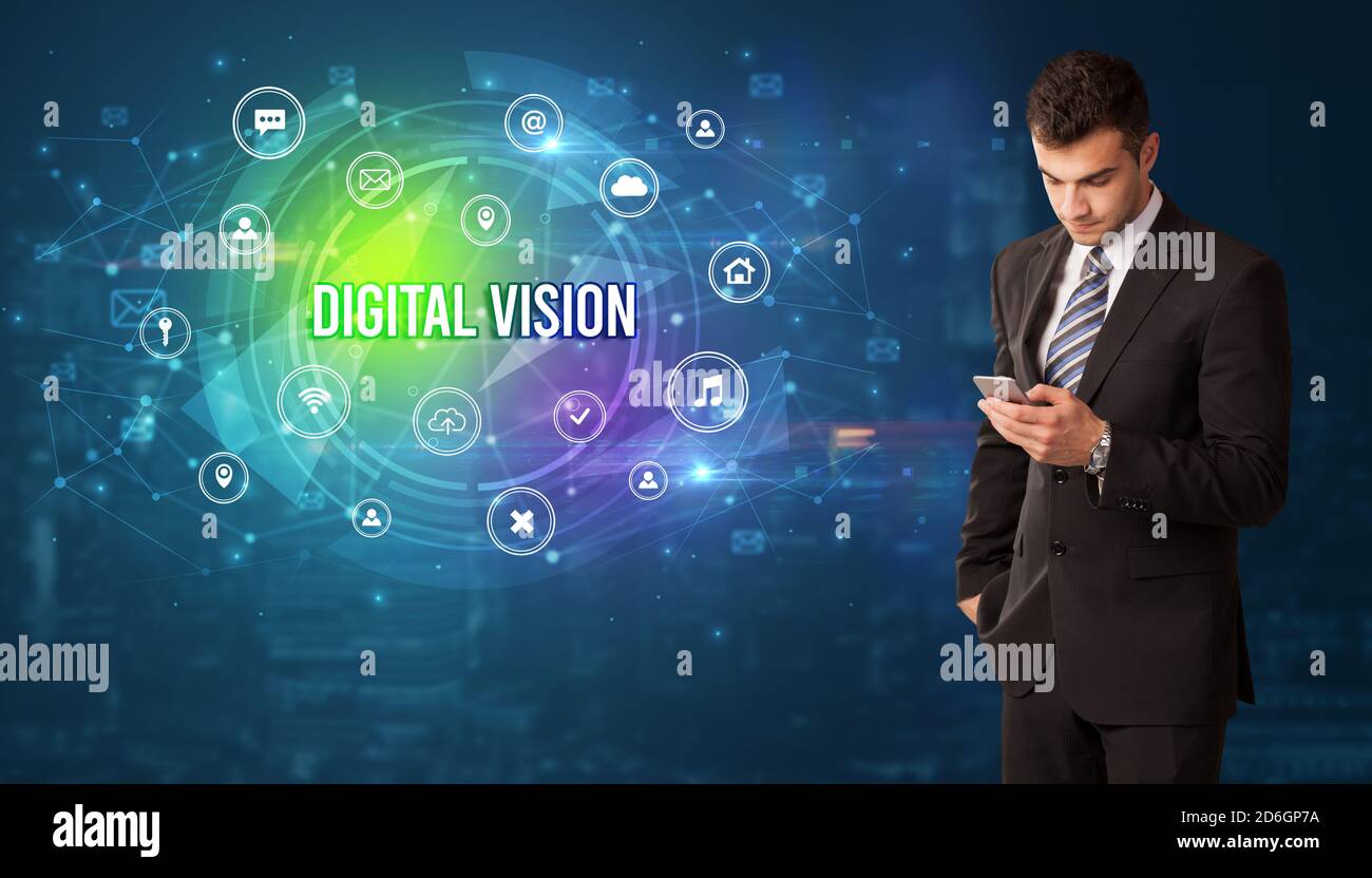 Businessman thinking in front of technology related icons and DIGITAL ...