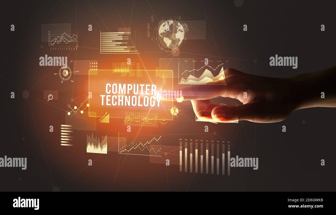 Hand touching COMPUTER TECHNOLOGY inscription, new business technology ...