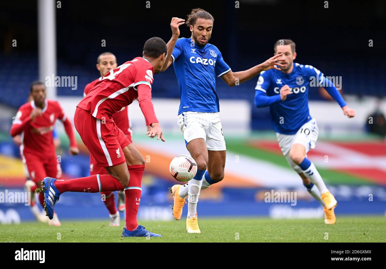 Liverpool's Joel Matip (left) and Everton's Dominic Calvert-Lewin battle for the ball during the Premier League match at Goodison Park, Liverpool. Stock Photo