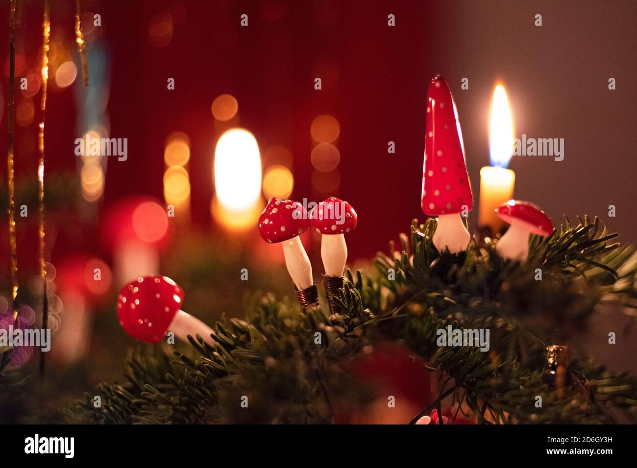 German christmas ornaments illuminated by candle light Stock Photo Alamy