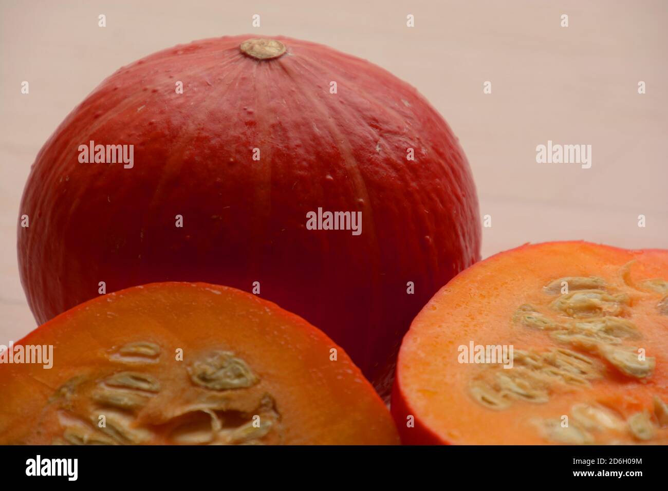 red hokaido close-up view with seeds and juicy pulp Stock Photo