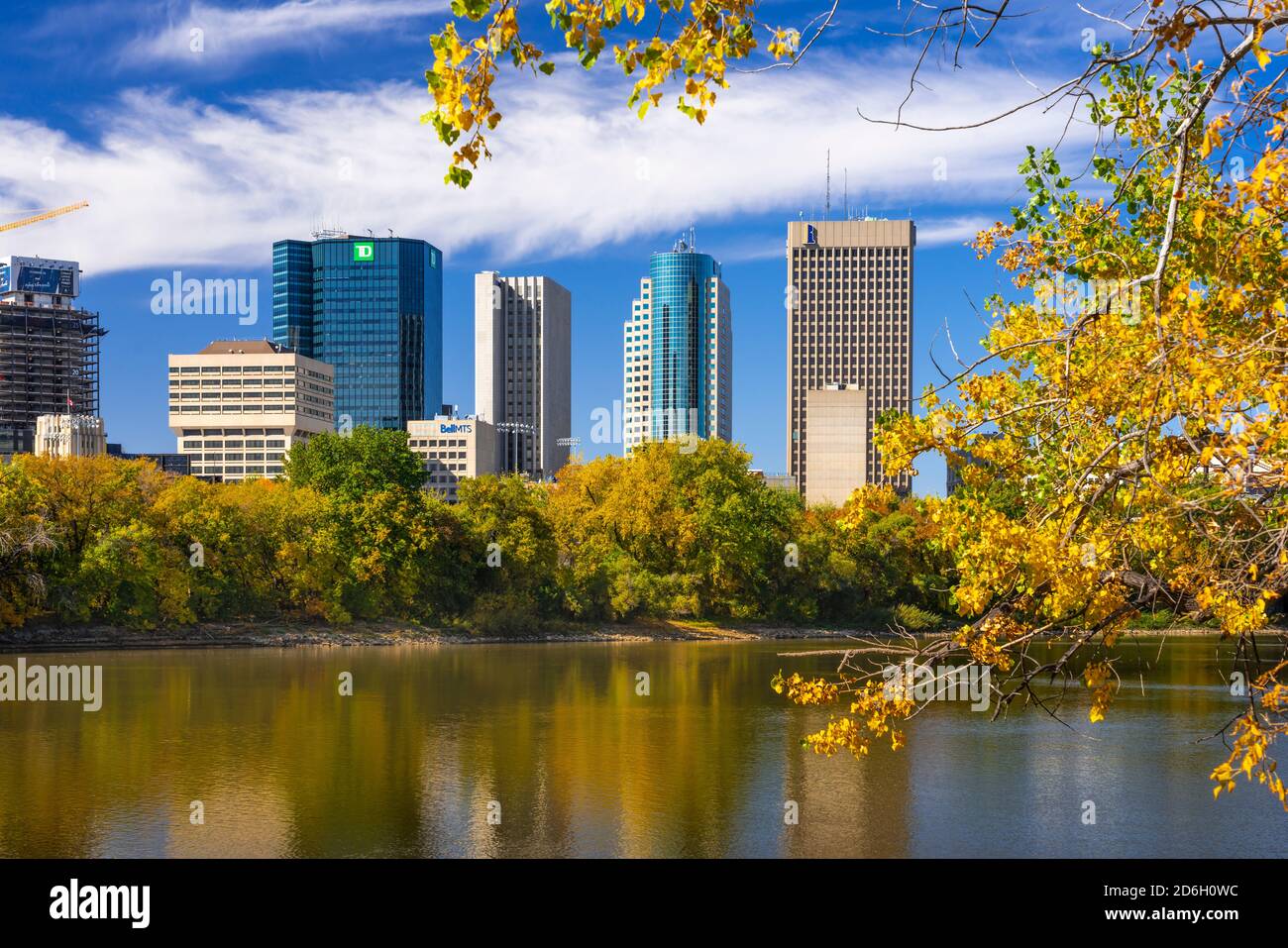 The city skyline with fall foliage color along the Red River, St. Boniface, Winnipeg, Manitoba, Canada. Stock Photo