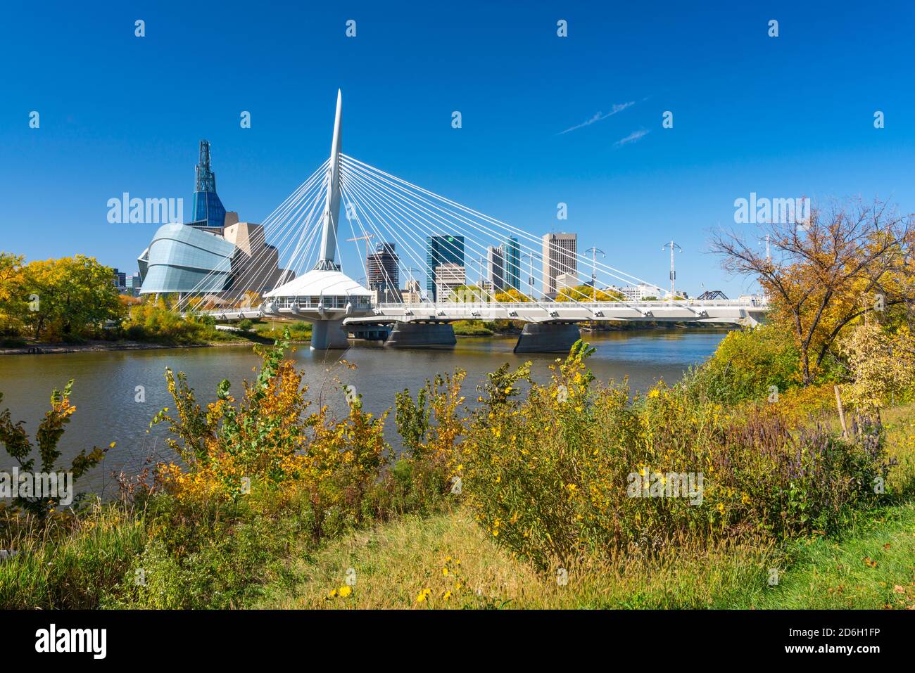 the-city-skyline-with-fall-foliage-color-along-the-red-river-st