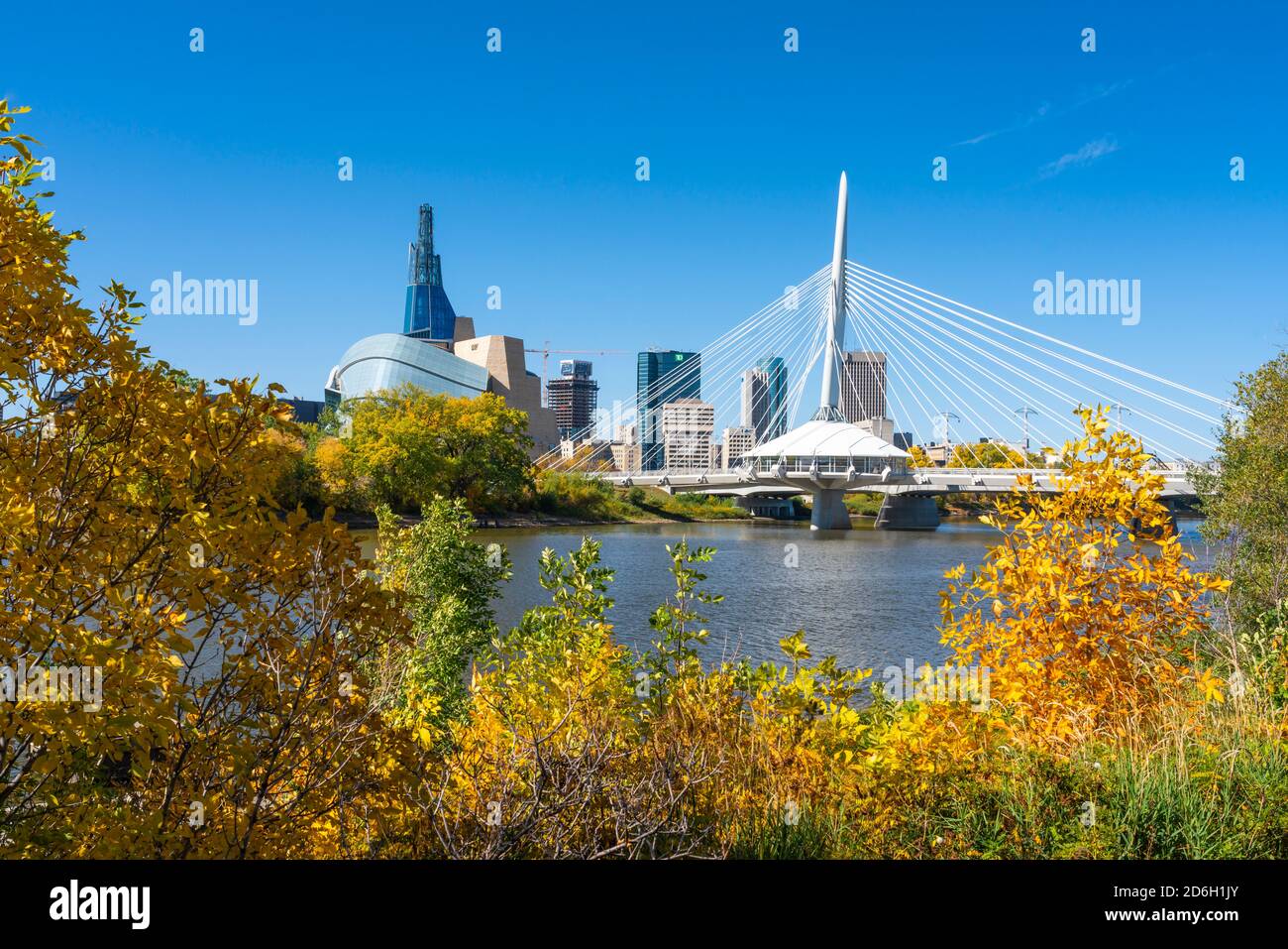 The city skyline with fall foliage color along the Red River, St. Boniface, Winnipeg, Manitoba, Canada. Stock Photo