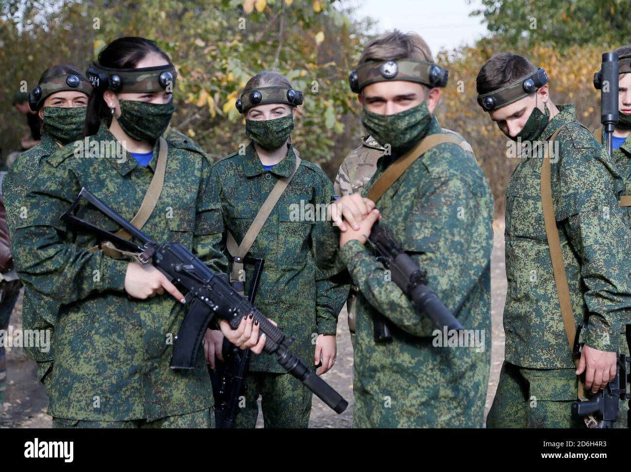 Members of a youth military patriotic club take part in a tactical shooting  game, also known as laser tag, in the rebel-controlled town of Makeyevka  (Makiivka) outside Donetsk, Ukraine, October 17, 2020.