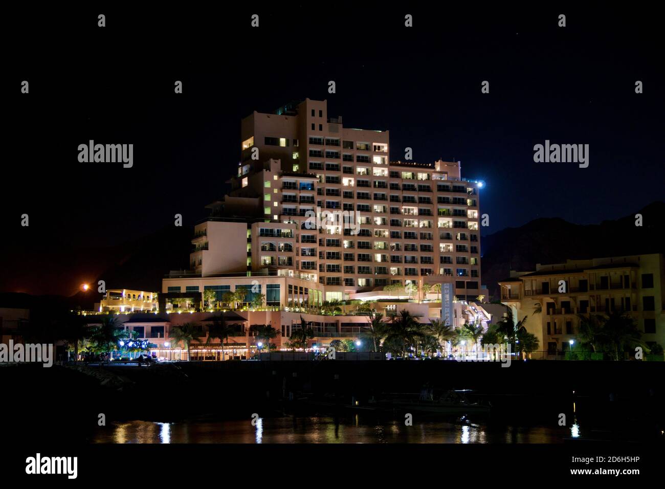 FUJAIRAH, UNITED ARAB EMIRATES - NOV 07th, 2017: View of the luxury beach hotel during night with black sky in the background Stock Photo