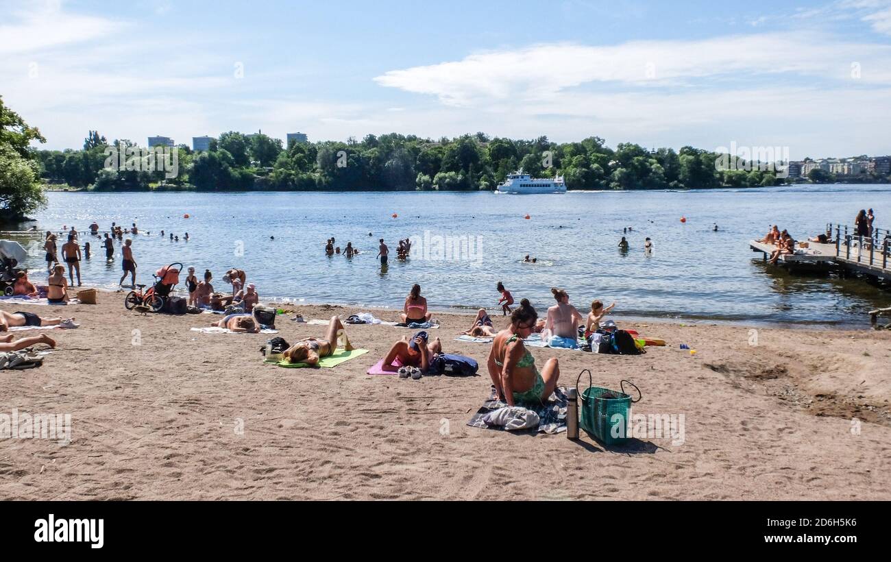 Smedsuddsbadet in Stockholm is a sandy beach and expanse of grass ...