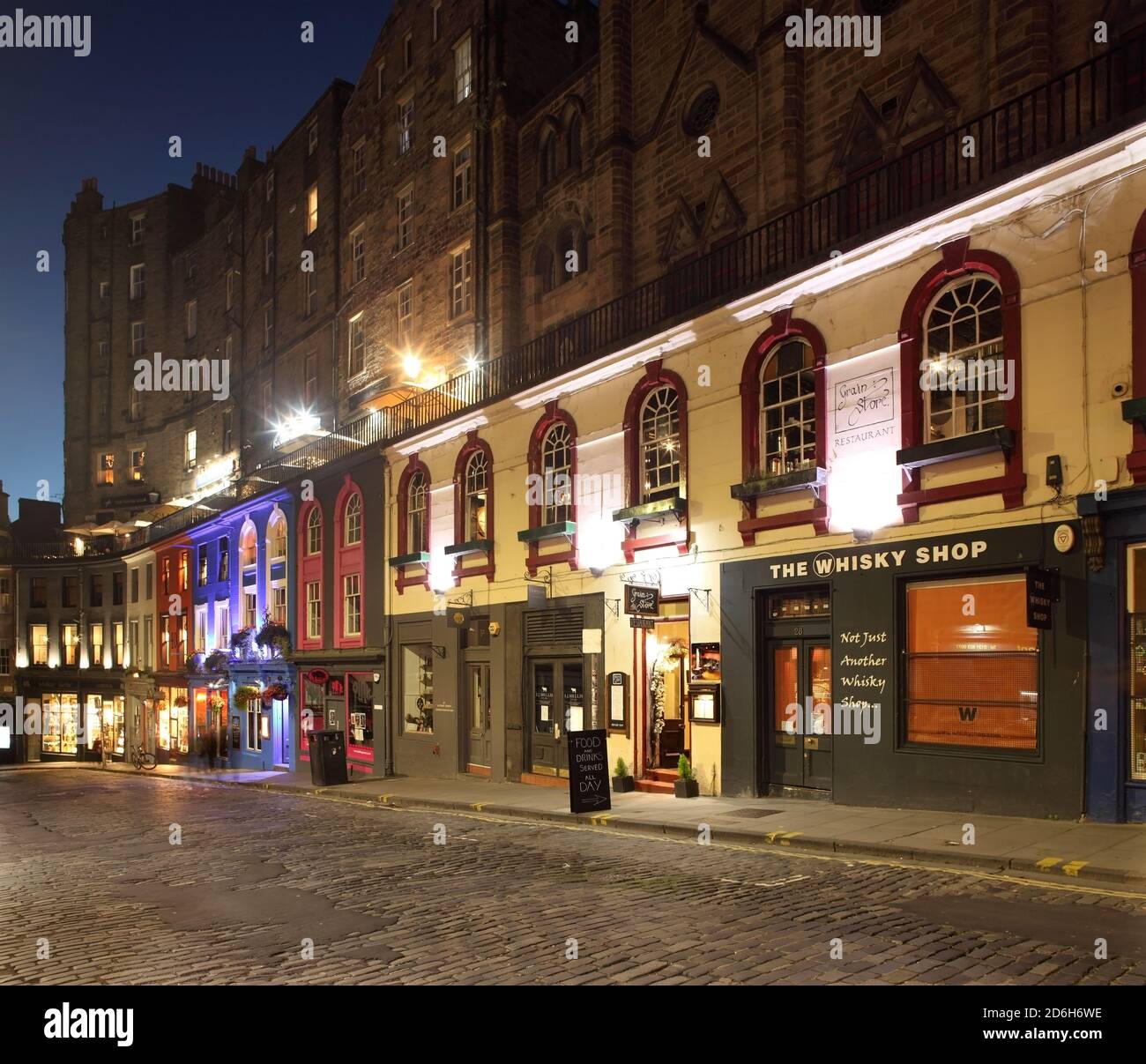 Shops and bars in Victoria Street, Edinburgh, Scotland Stock Photo Alamy