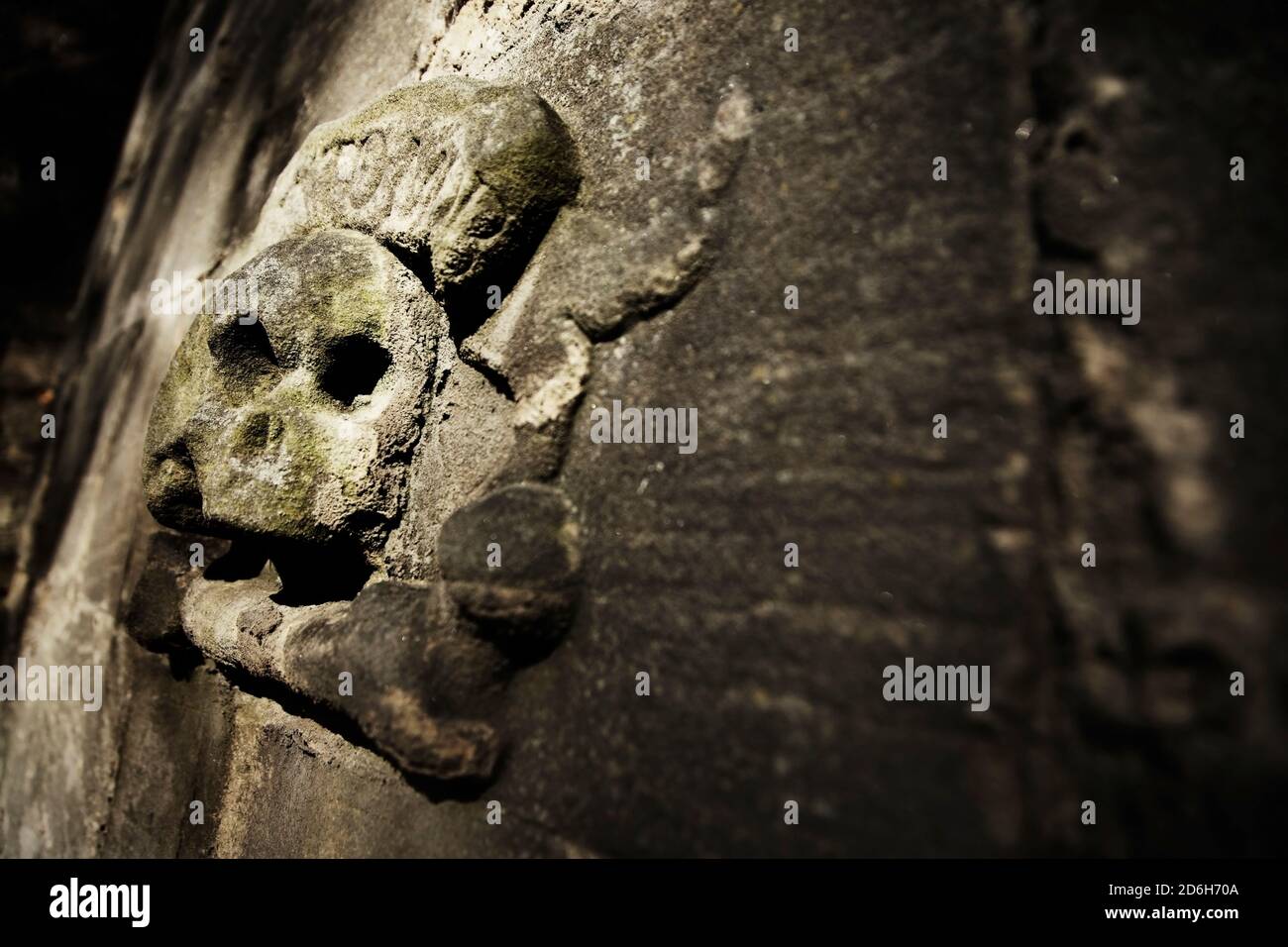 Memento Mori carved into stone wall in Greyfriars Kirkyard, Edinburgh, Scotland. Stock Photo