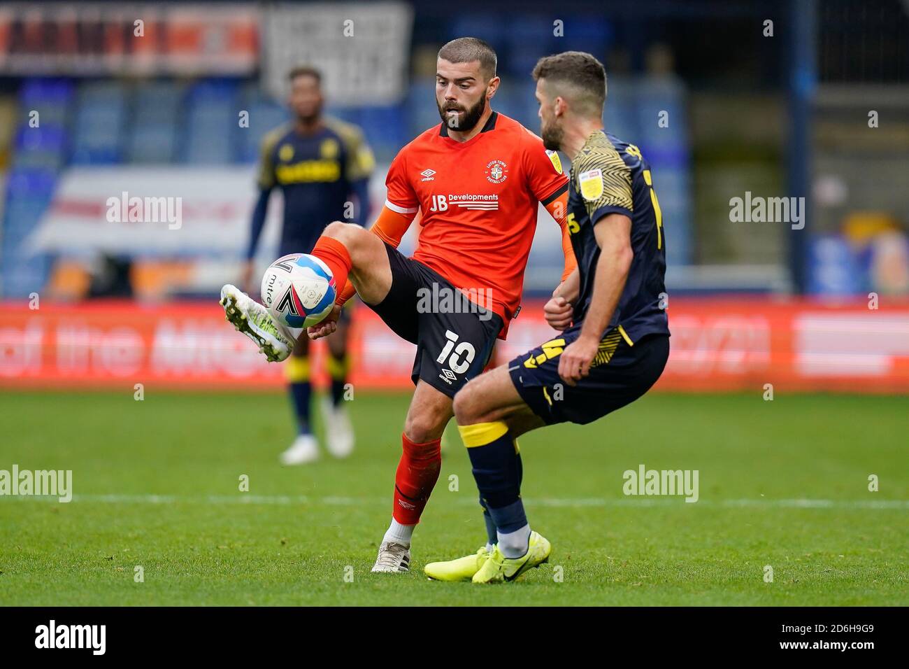 Luton, UK. 17th October, 2020. Elliot Lee (10) of Luton Town and Tommy Smith (14) of Stoke City during the Sky Bet Championship match between Luton Town and Stoke City at Kenilworth Road, Luton, England on 17 October 2020. Photo by David Horn/PRiME Media Images. Credit: PRiME Media Images/Alamy Live News Stock Photo