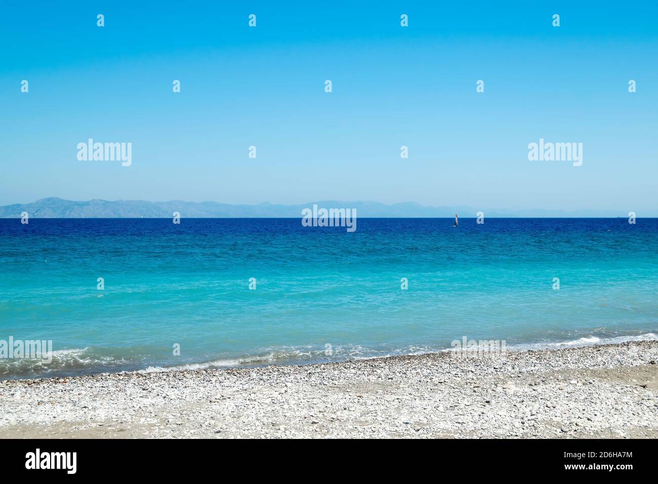 Blue skies over sunny beach hi-res stock photography and images - Alamy