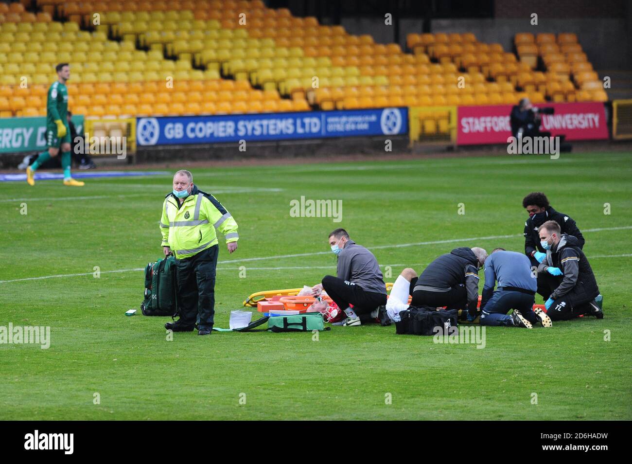 Salford???s Darron Gibson lies injured during the Sky Bet League Two match at Vale Park, Stoke-on-Trent. Stock Photo