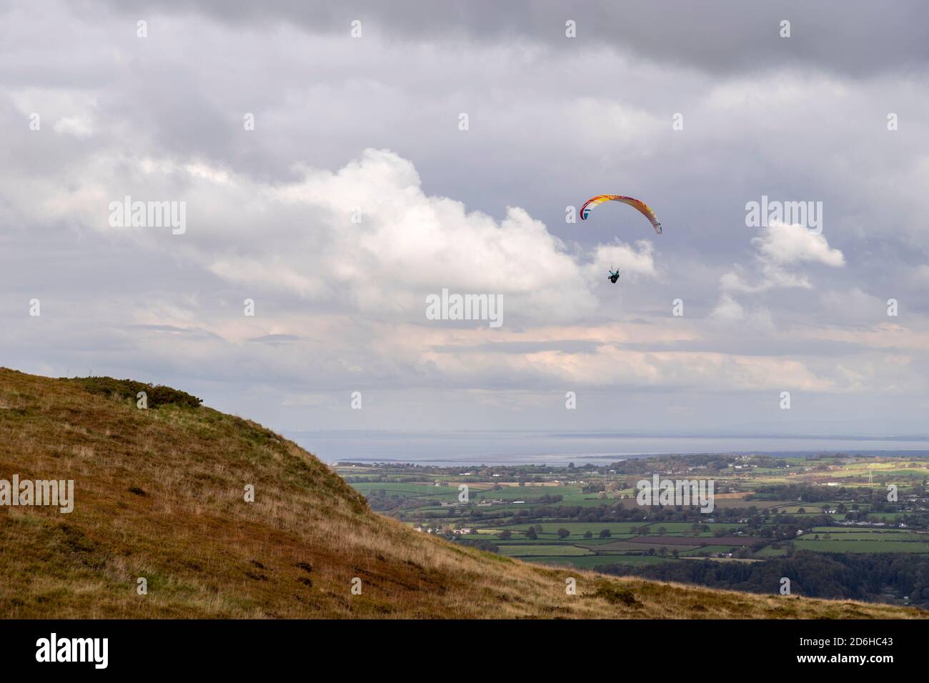 Paraglider over the Clwydian Range, North Wales Stock Photo