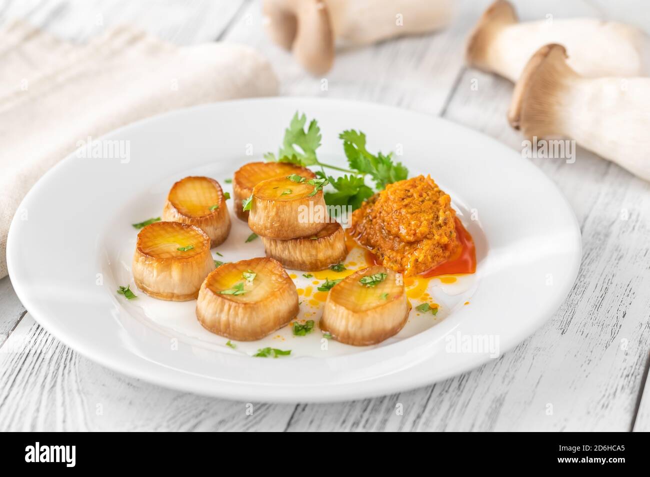 King oyster mushroom scallops white plate Stock Photo Alamy
