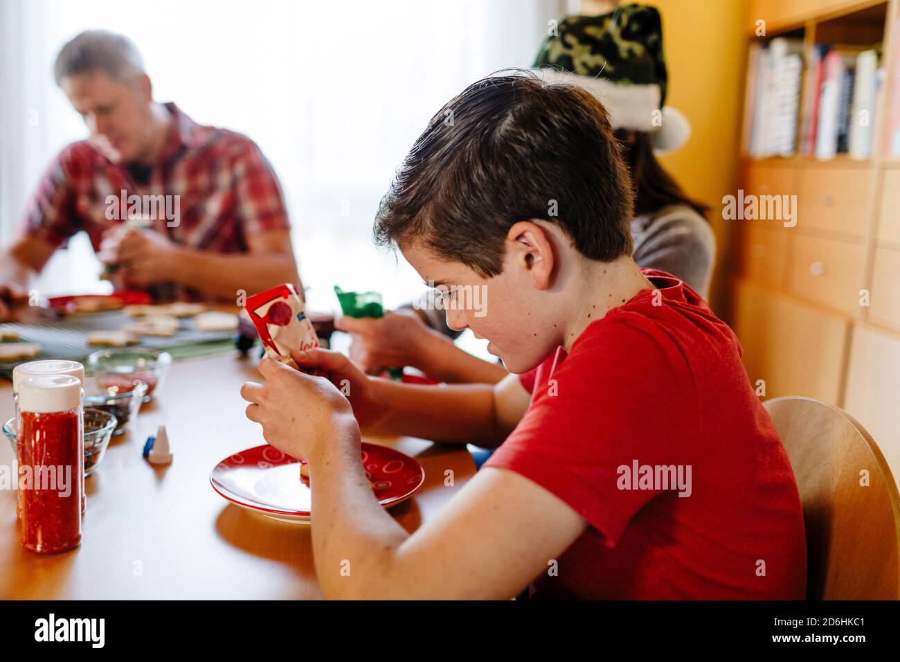 Teen boy dinner table hi-res stock photography and images - Alamy