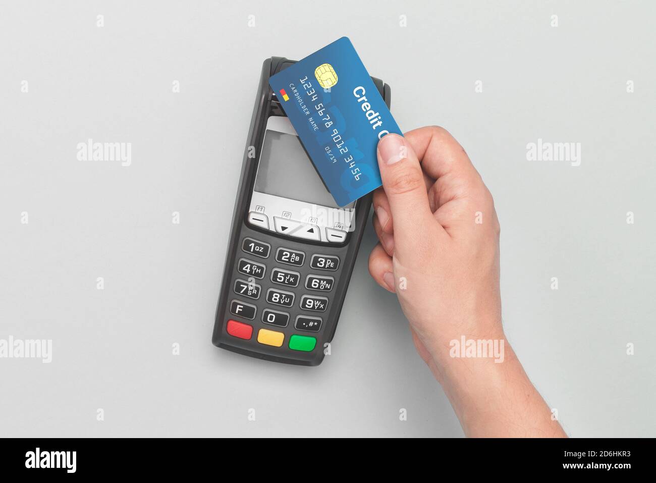 Credit card payment terminal. Man using credit card. Stock Photo