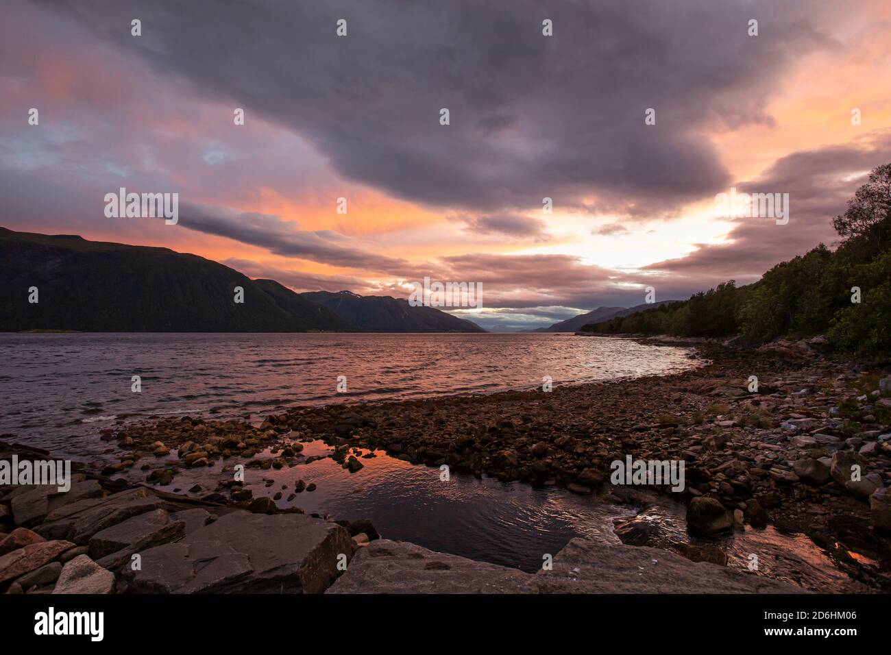 A colorful Norwegian sunset on the fjord Stock Photo