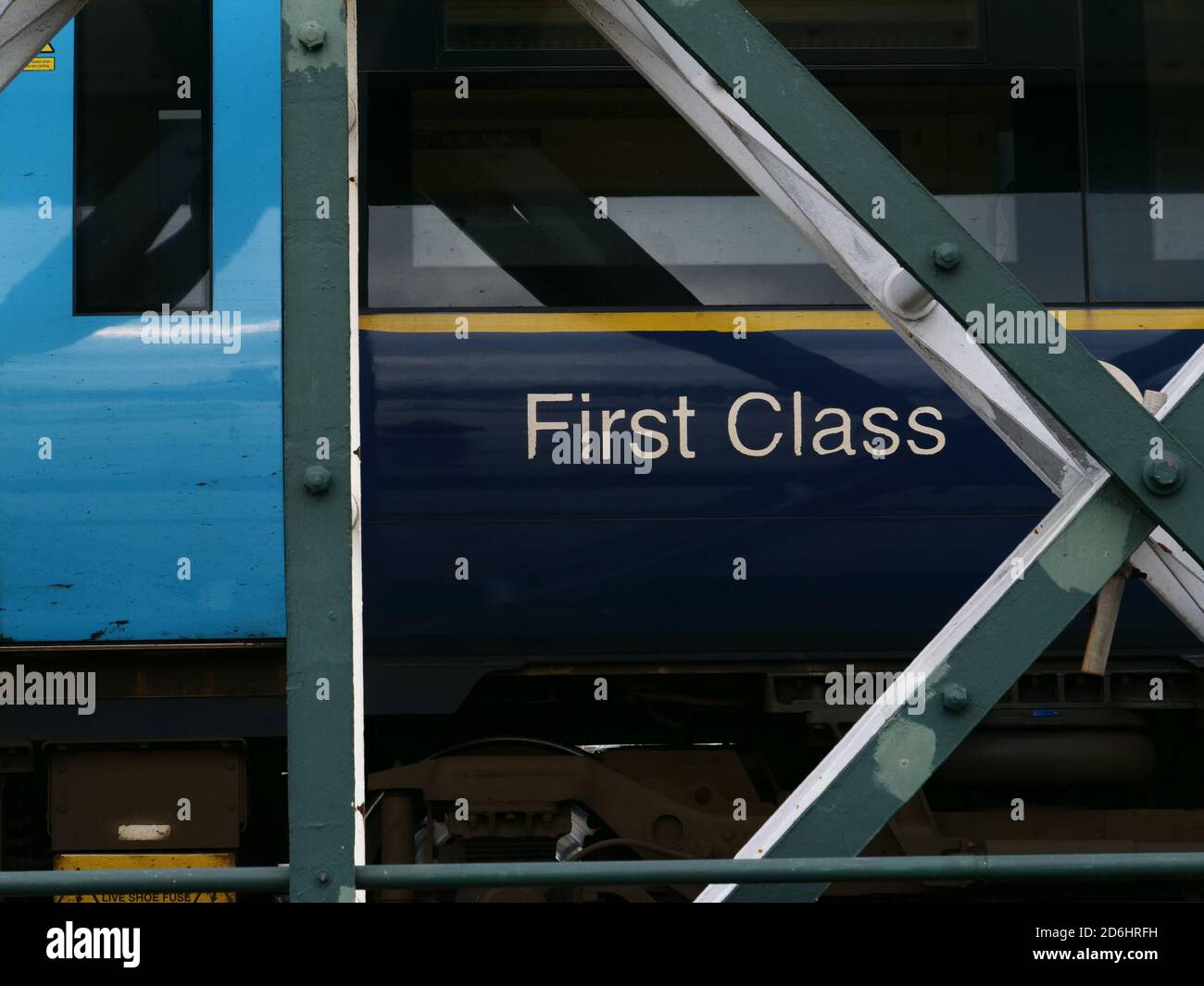 First Class sign seen on the side of a train carriage. Stock Photo