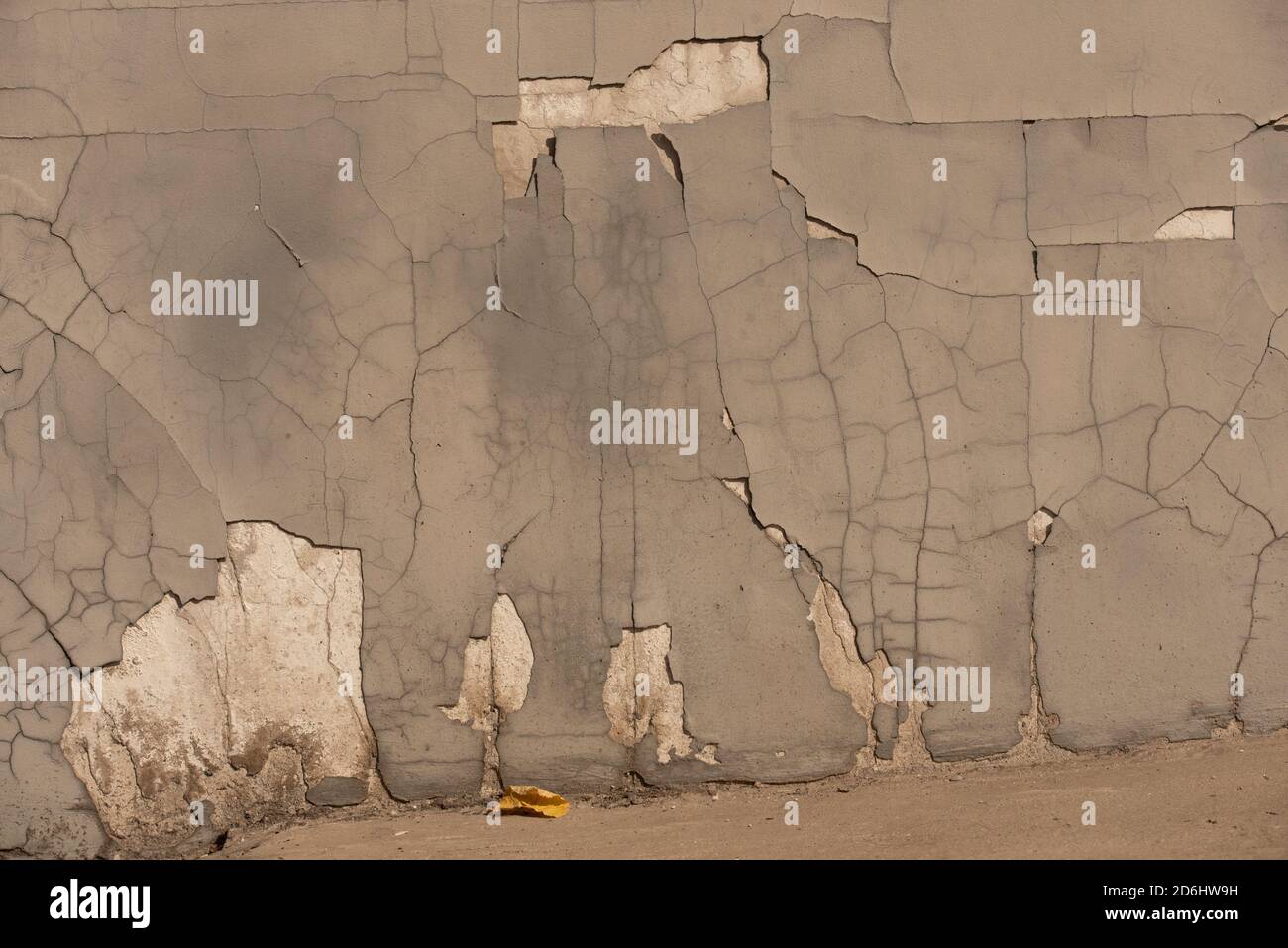 cracked wall background. Gray wall cracked. Grey Stock Photo