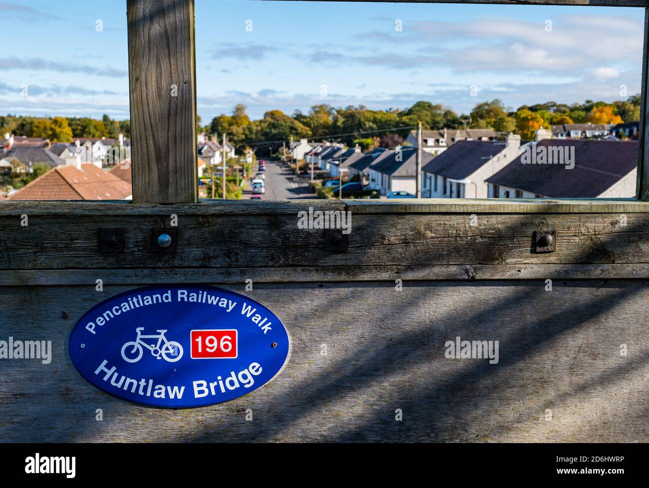 Cycling route 196 sign on bridge, Pencaitland railway walk on sunny day, East Lothian, Scotland, UK Stock Photo