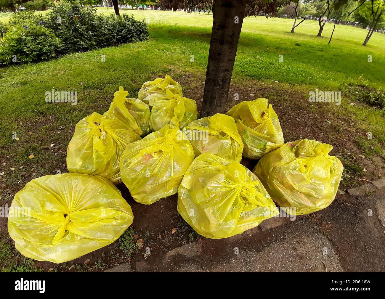 Yellow garbage bag hi-res stock photography and images - Alamy