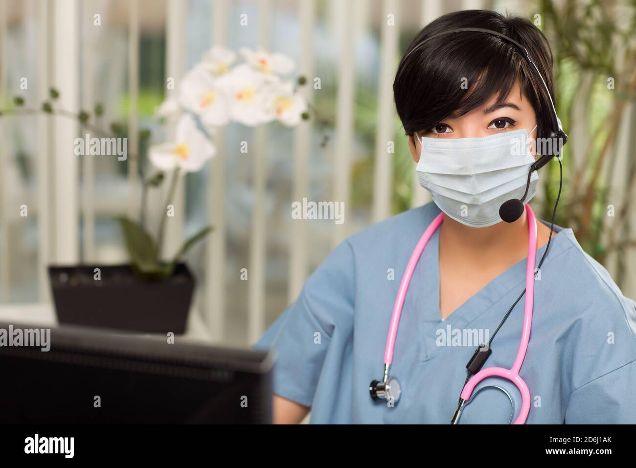 Nurse front desk mask hi-res stock photography and images - Alamy