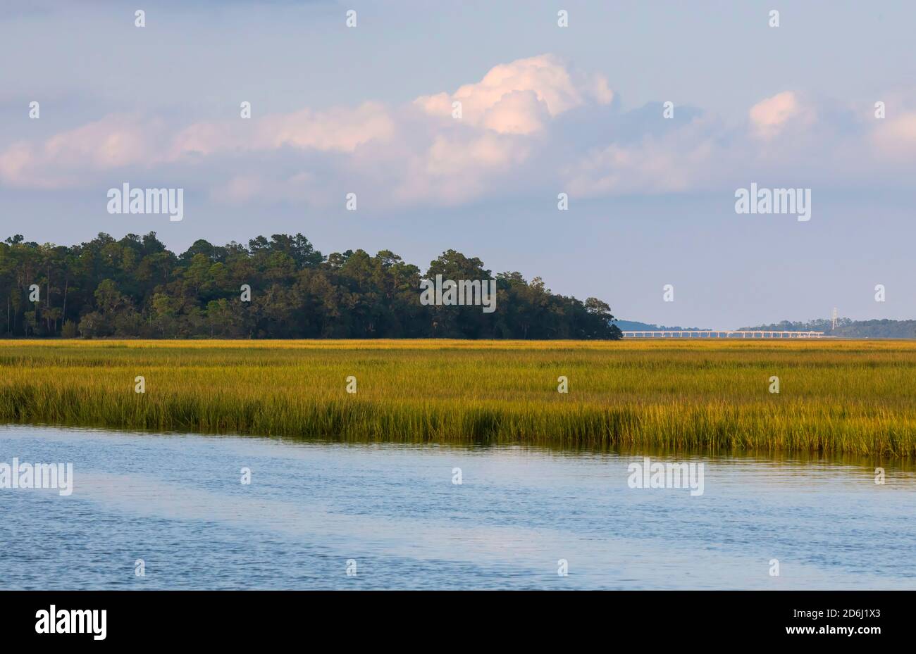 Bryan Creek off Calibogue Sound in South Carolina in early fall. The Karl Bowers Bridge access to Hilton Head Island can be seen in the distance. Stock Photo