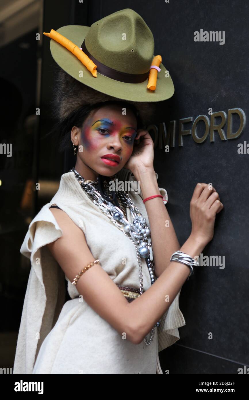 A model showcases Pierre Garroudi collection during the flash mob fashion show in Kightsbridge. Stock Photo