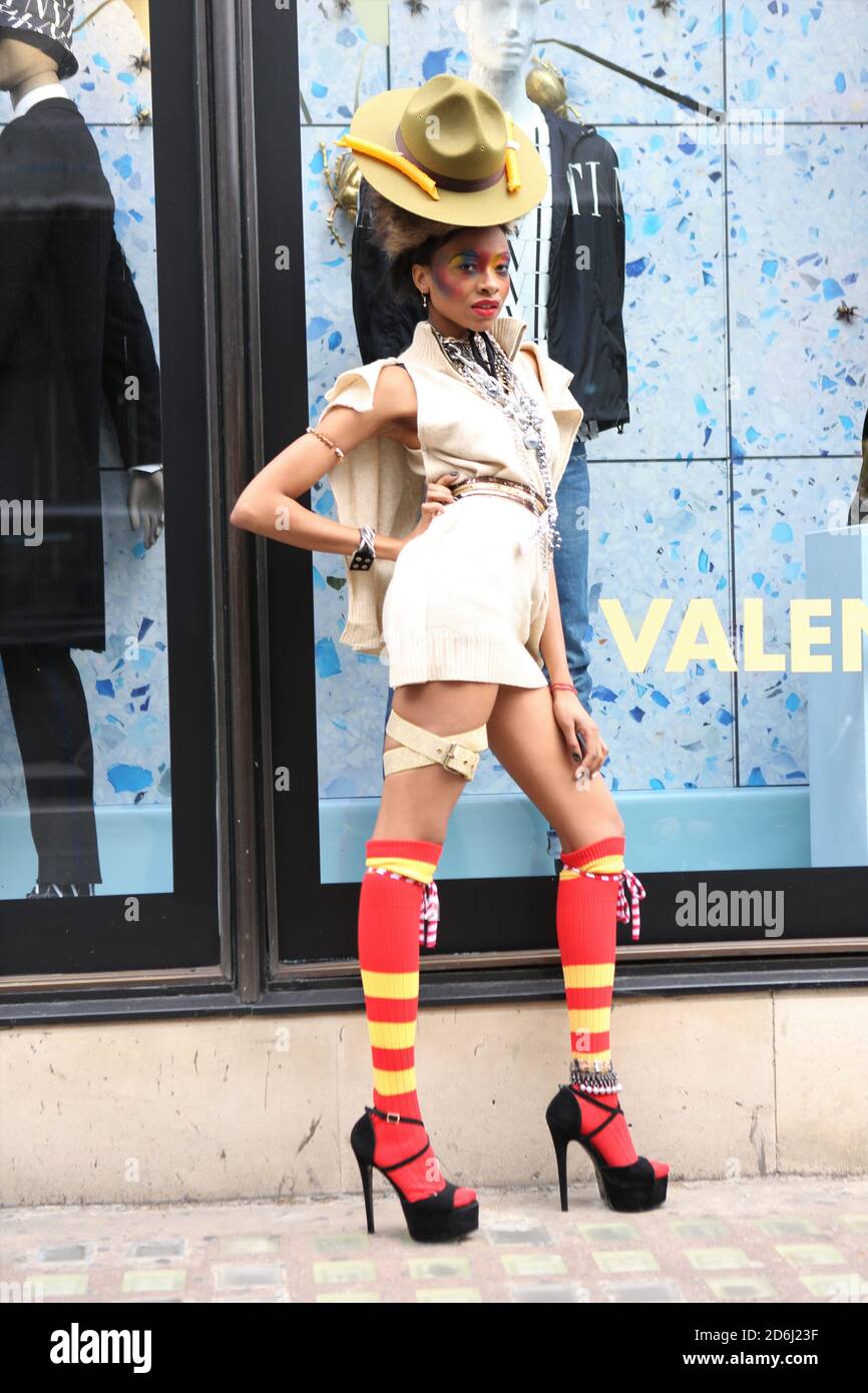A model showcases Pierre Garroudi collection during the flash mob fashion show in Kightsbridge. Stock Photo