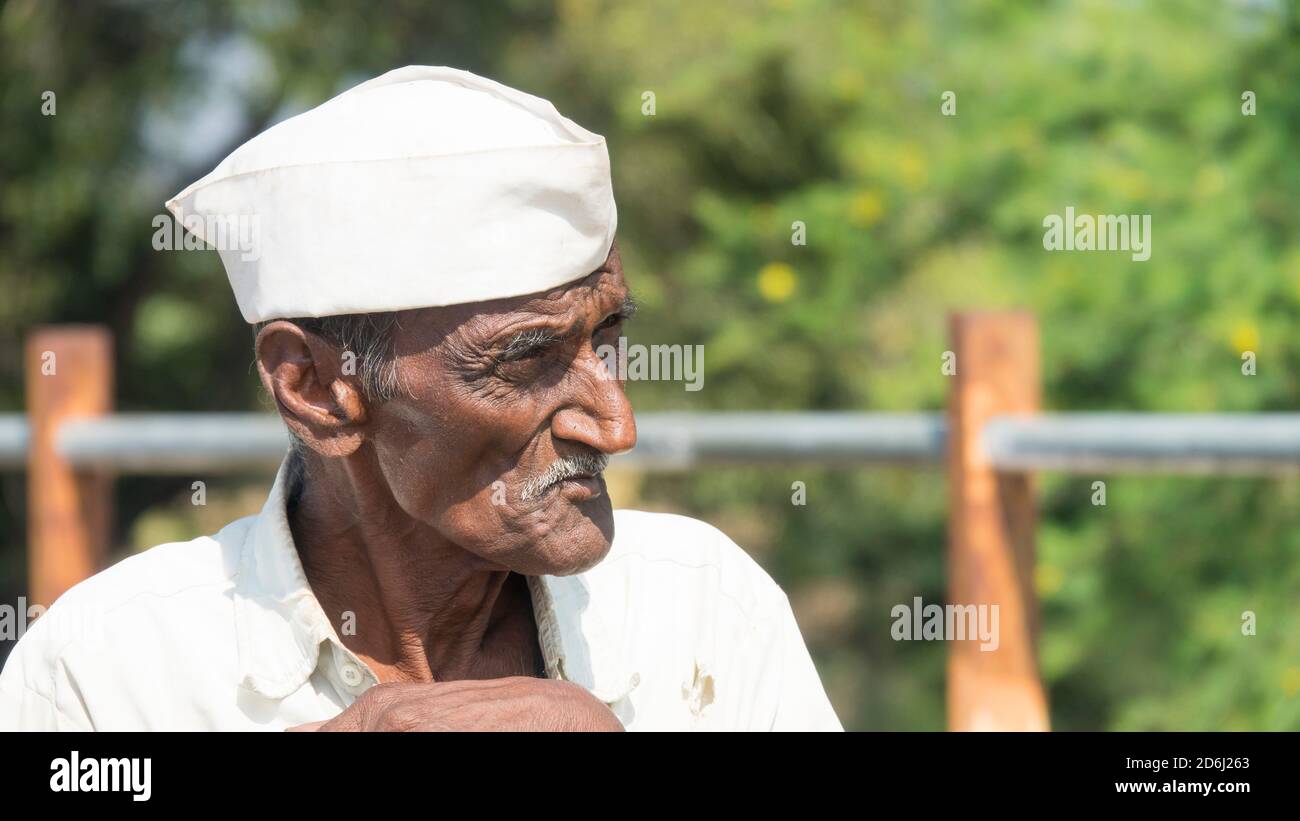 Latur / India December 2017 Portrait of old poor farmer living in rural area of Latur, Maharashtra, India Stock Photo