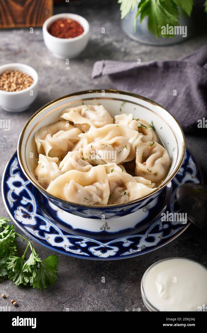 Traditional azian Manti, dumplings with minced meat Close up Stock Photo