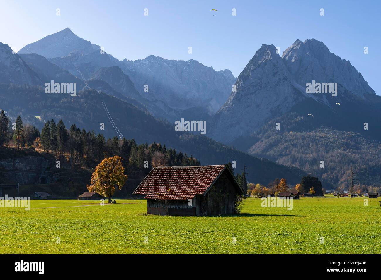 Hay barn, green meadow, Zugspitze in the background, mountain landscape, near Grainau, Garmisch-Partenkirchen, Upper Bavaria, Bavaria, Germany Stock Photo