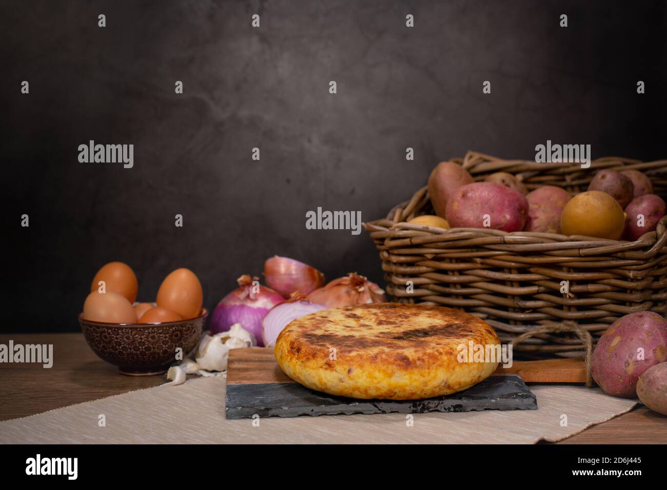 Closeup of a tasty looking pie with potatoes, eggs, and onions in the