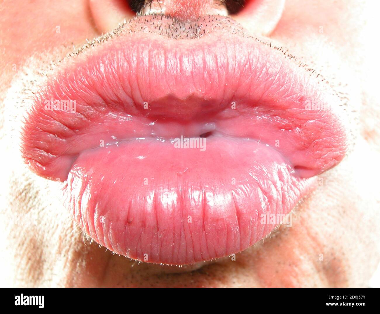 Male lips kiss hi-res stock photography and images - Alamy