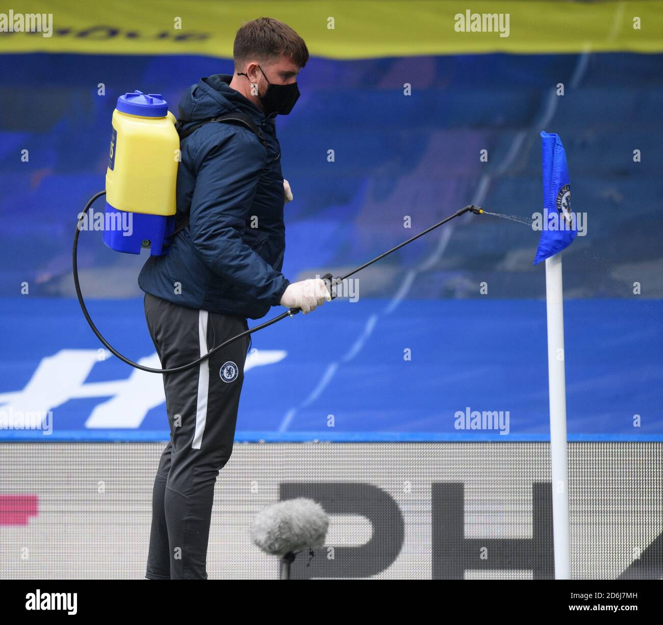London, England, 17th Oct 2020  An offical sprays the corner flag with disinfectant as an anti Covid 19 measure  Chelsea v Southampton.  Premier League. Credit : Mark Pain / Alamy Live News Stock Photo