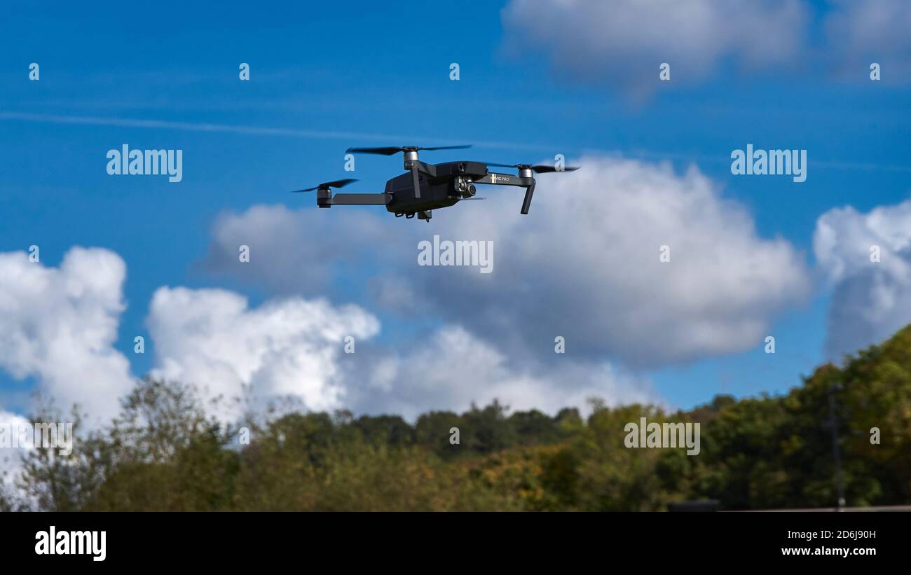 Fluying drone in the park Stock Photo