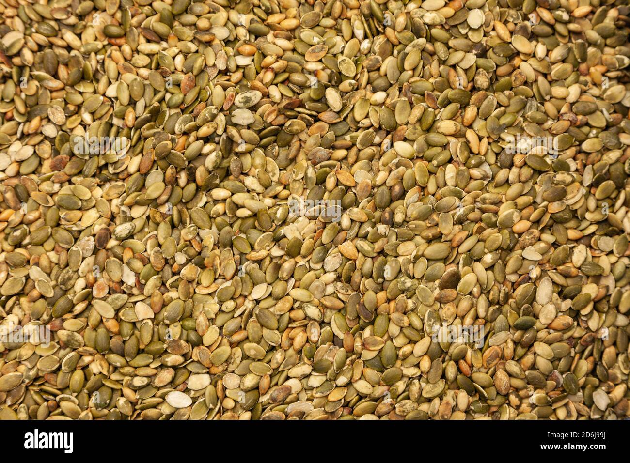 Shelled and roasted Pumpkin Seeds in bulk form Stock Photo Alamy