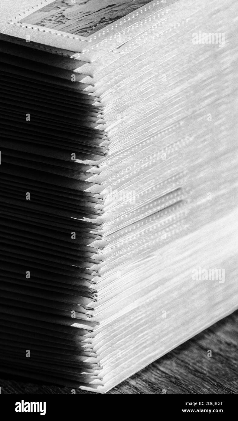 A macro shot of a stack of envelopes filled with letters, for The Big Send by Vote Forward, creates a tower of paper Stock Photo