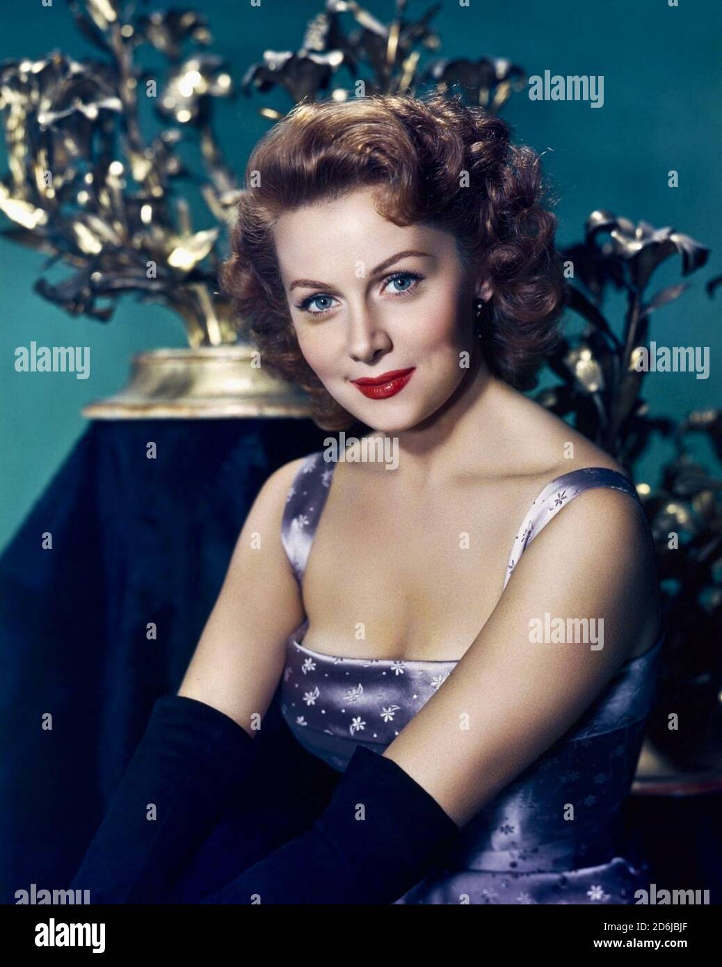 Rhonda Fleming (born Marilyn Louis; August 10, 1923) is a retired American film/television actress and singer. She acted in more than forty films, mostly in the 1940s and 1950s, and became renowned as one of the most glamorous actresses of her day. She was nicknamed the 'Queen of Technicolor' because her fair complexion and flaming red hair photographed exceptionally well in Technicolor Credit: Hollywood Photo Archive/MediaPunch Stock Photo