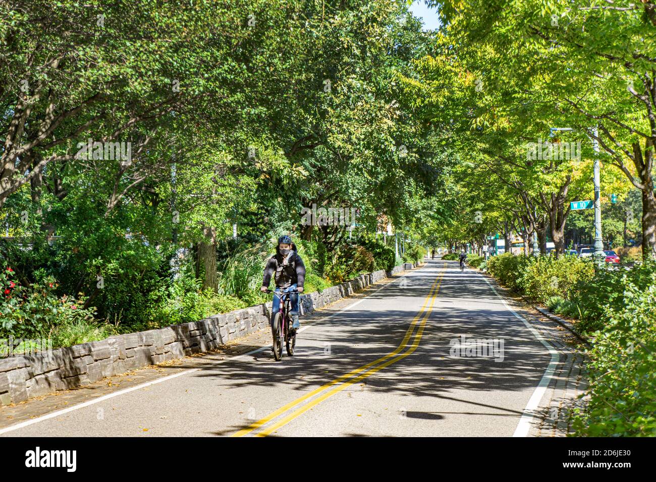 Cyclist on Bike and Jogging Path along West Side Highway, New York City, New York, USA Stock Photo