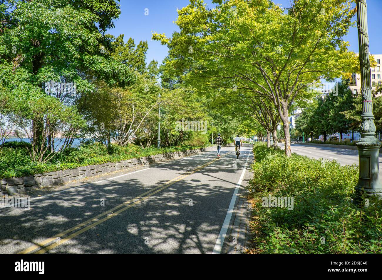 Cyclists and Joggers on Bike and Jogging Path along West Side Highway, New York City, New York, USA Stock Photo