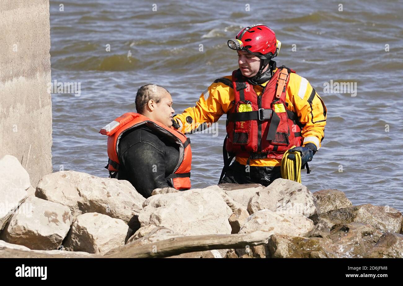 Firefighter examines hires stock photography and images Alamy