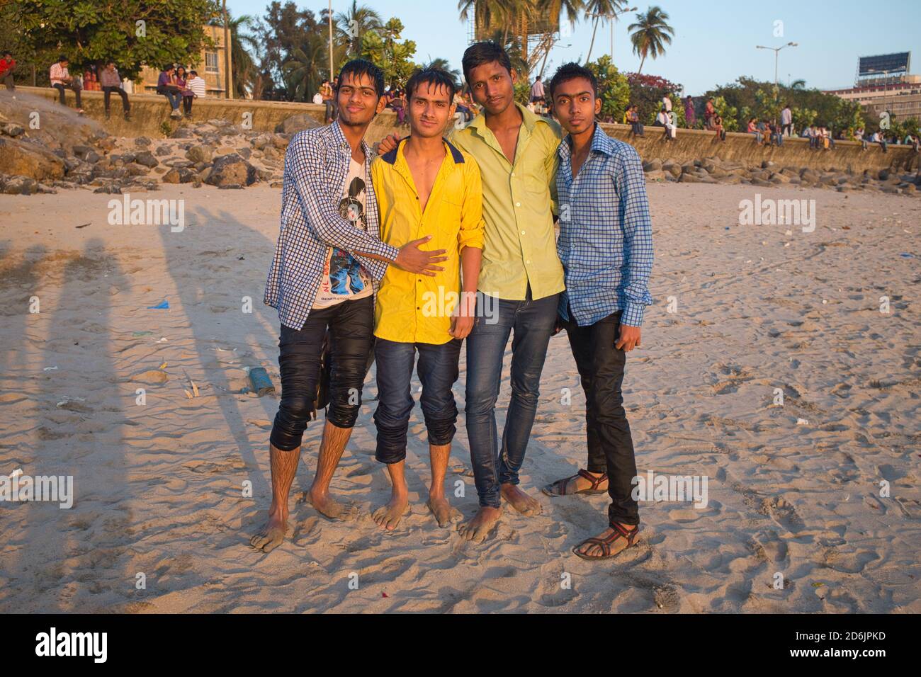 A group of Indian teenage boys visiting Chowpatty Beach in Mumbai, India, posing for a photo Stock Photo