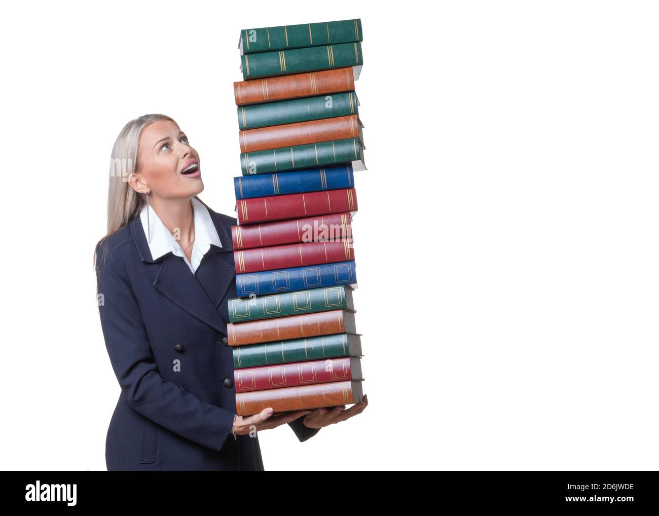 Smiley businesswoman or lawer holding a lot of books. Isolated on white background. Stock Photo