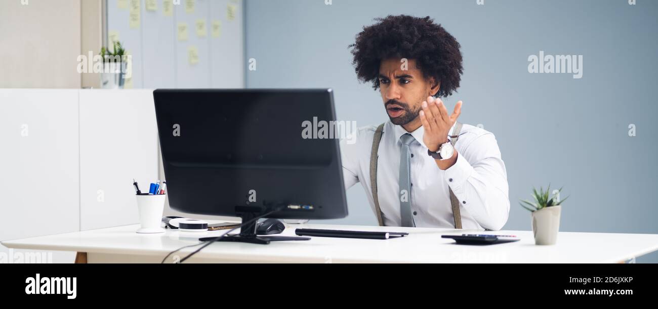 African Business Man In Elearning Video Conference Webinar Stock Photo