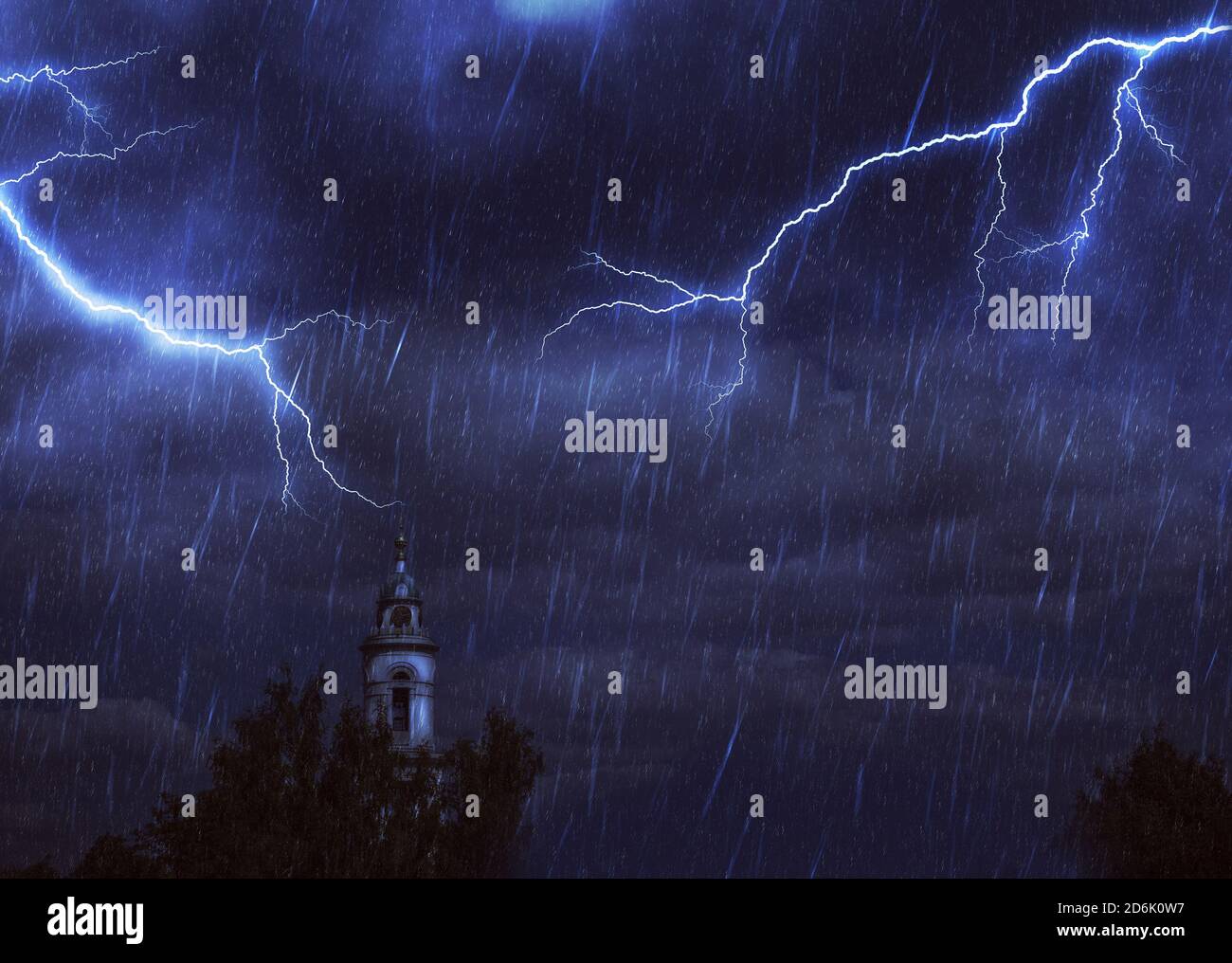 Clock Rainstorm Ancient church clock tower night stormy landscape with rain and ...