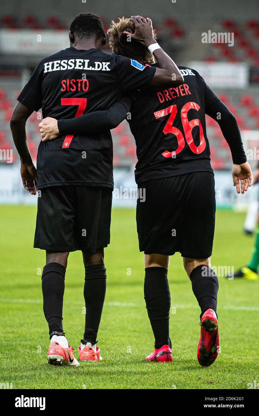 Herning, Denmark. 17th Oct, 2020. Anders Dreyer (36) of FC Midtjylland  scores for 2-1 and celebrates with Pione Sisto (7) during the 3F Superliga  match between FC Midtjylland and Odense Boldklub at
